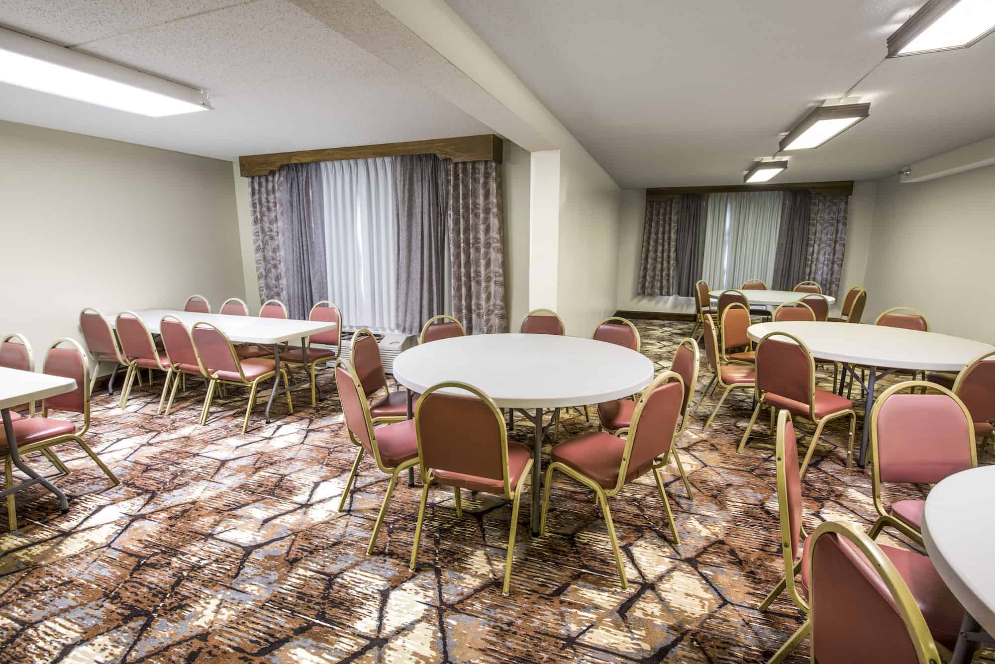 Large meeting room with tables and chairs