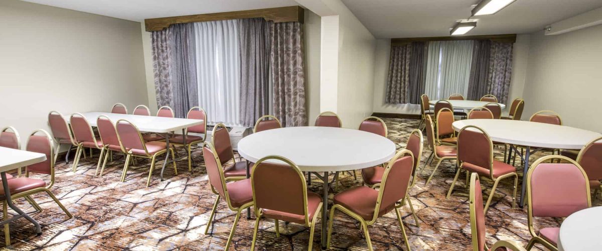 Large meeting room with tables and chairs